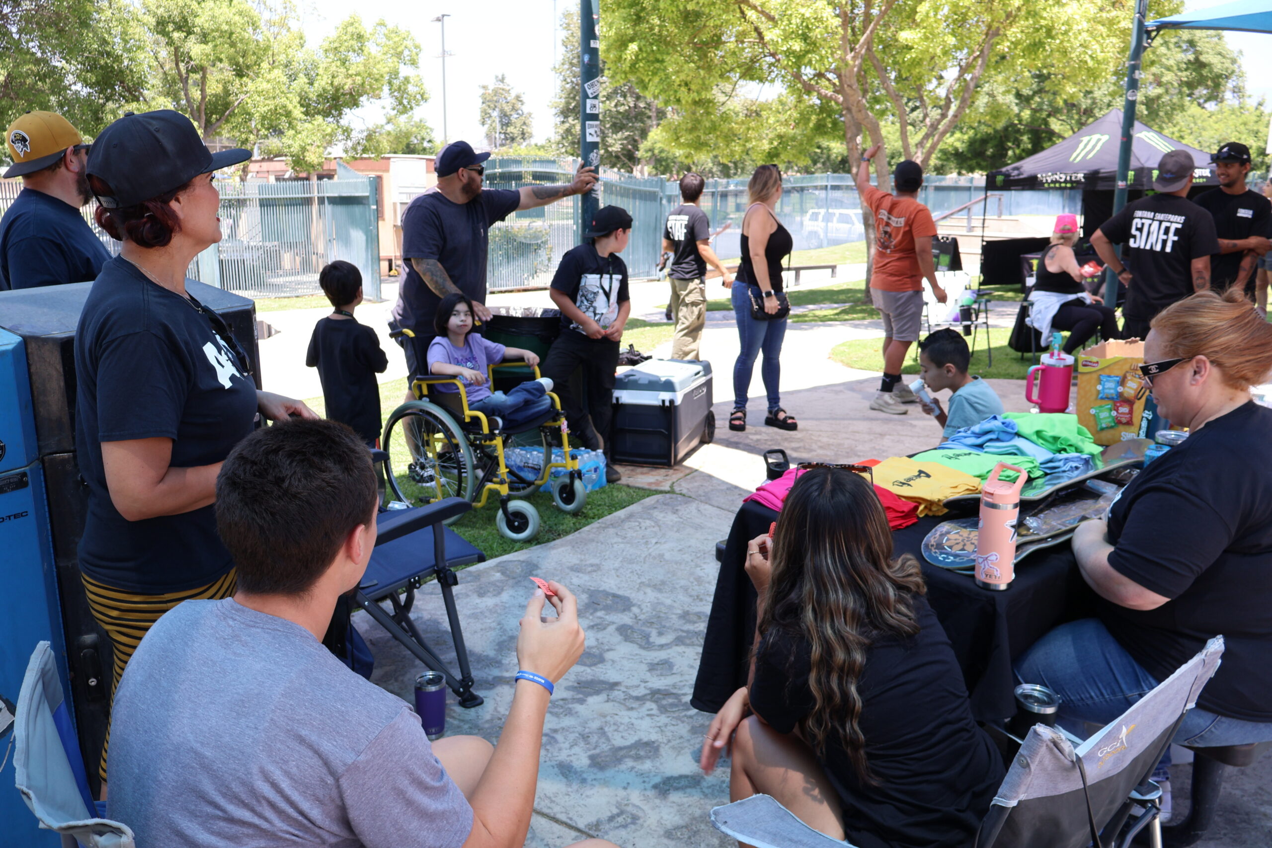 Participants, families and staff at a Fontana adaptive skate event.